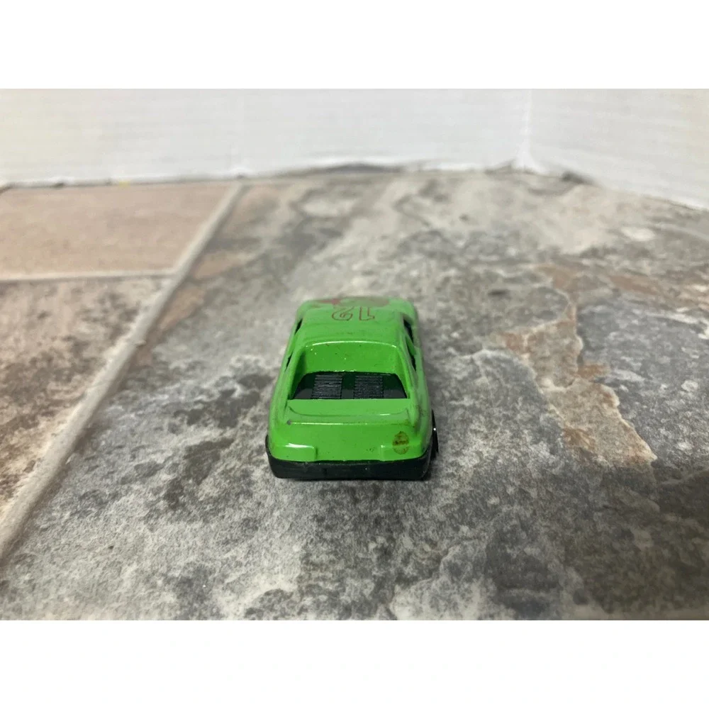 Green Race Car Toy Model Number 12 with Fox Logo‎